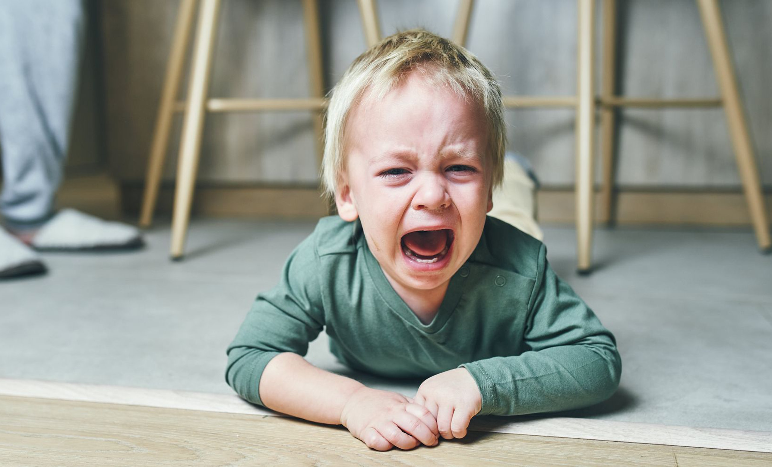 Child Screaming On The Floor